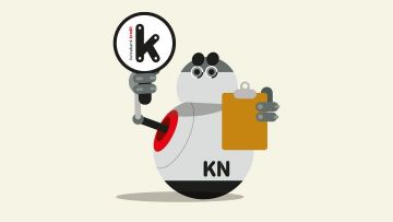 Irudian, bola formako robot bat ageri da, Kutxabanken kartel bati eutsita.